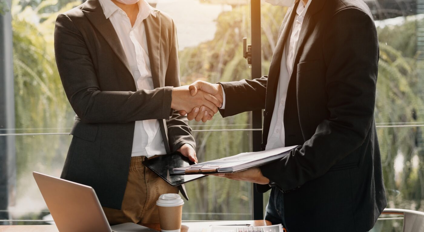 Close up on hands of business people join together their hands together on unity concept
